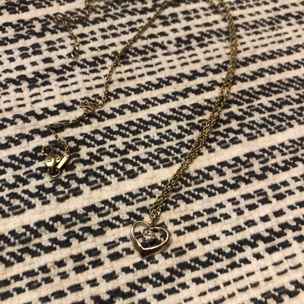 Heart pendant with diamond inside